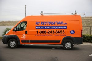 911-restoration-water-damage-mold-remediation-fire-damage-person-van-wideangle Orange County