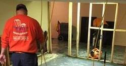 911 Restoration Water-Damage-Restoration-Technicians-Cleaning-Carpet-After-A-Flood Orange County