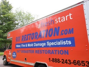 911-restoration Water-Damage-Restoration-Truck-Parked-At-Residential-Job-Site Orange County